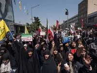 عکس های خیلی خاص و متفاوت خبرگزاری فرانسه از تجمع خیابان انقلاب تهران