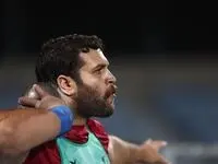 ورزشکار ایرانی چگونه در پرتاب وزنه طلا گرفت؟ + جزئیات