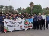 راهپیمایی دانش‌آموزان مجموعه مدارس امام حسین (ع) دویست دستگاه فولاد خوزستان