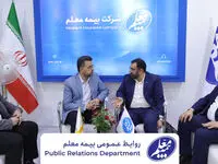 بازدید مدیرکل روابط عمومی بیمه مرکزی از غرفه بیمه معلم در نمایشگاه آسانسور