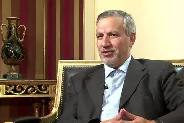 عکس عطاالله مهاجرانی در راهپیمایی حامیان حماس با تیپ متفاوت