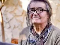 عکس متفاوت از رضا رویگری با ویلچر در راهپیمایی ۲۲ بهمن تهران
