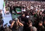 فیلم اقامه نماز آیت‌الله جوادی‌ آملی بر پیکر امام شهید در جمکران با حضور پرشور مردم و علما
