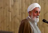 تصویر متفاوت از ناطق نوری در مراسم تشییع شهدا