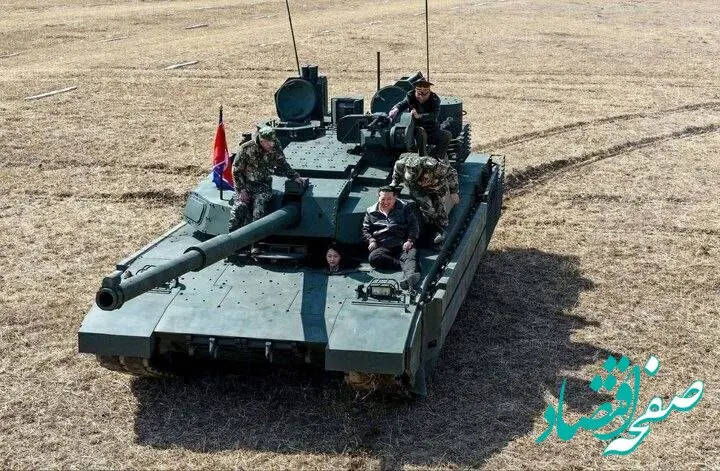 تصویر خاص رهبر کره شمالی به همراه دخترش سوار بر تانک در رزمایش نیروی زمینی 